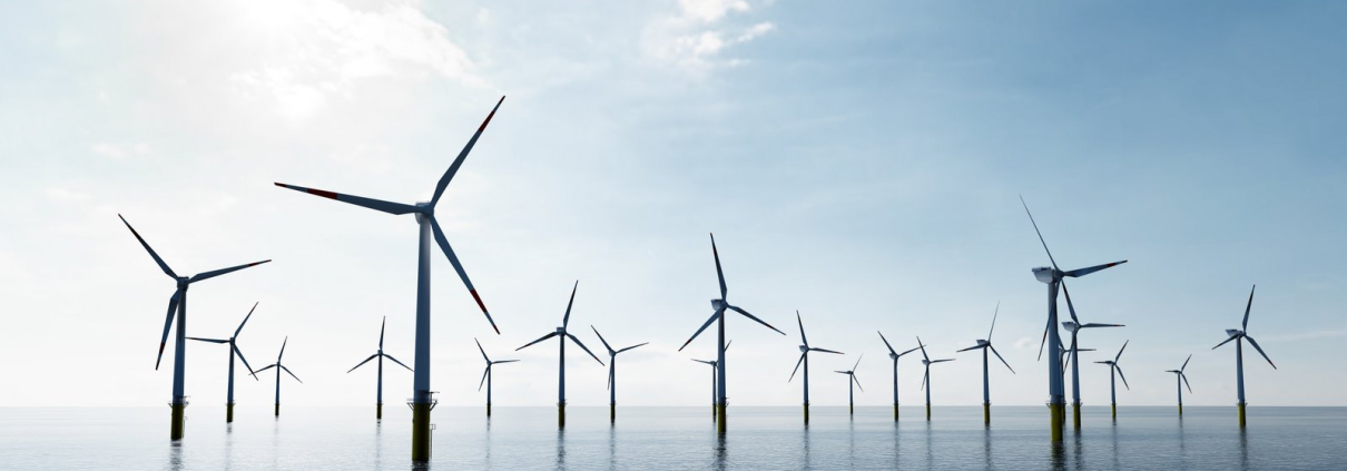 Offshore wind turbines farm on the ocean. Sustainable energy