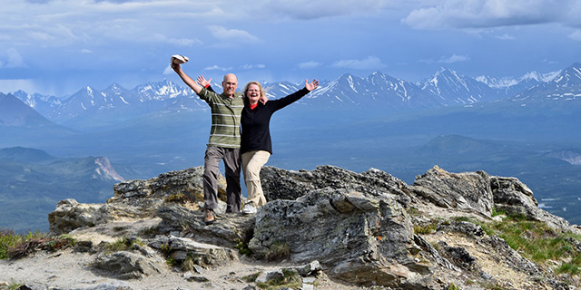 Photo of active happy seniors on a mountain